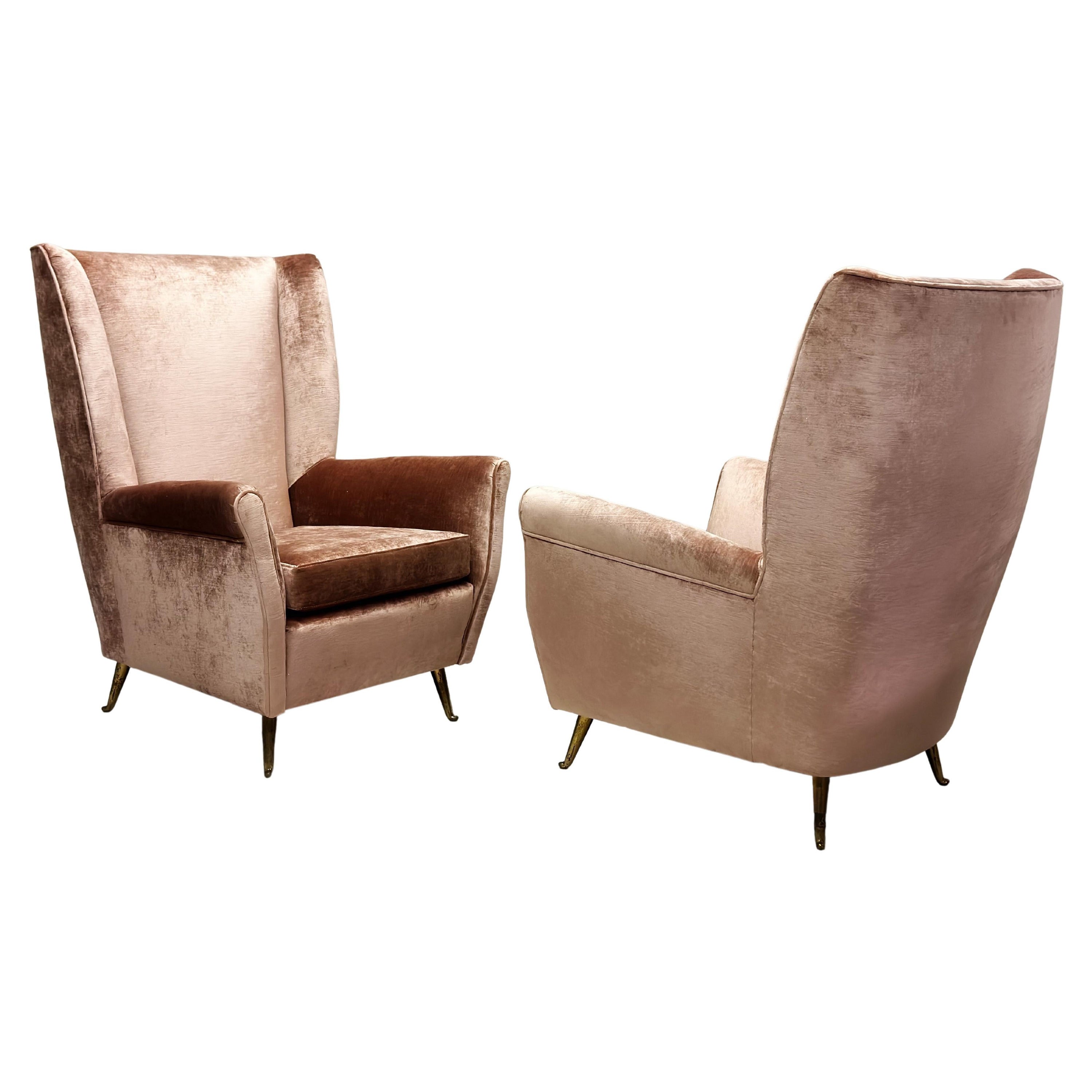 Pair of Italian Mid-Century Wingback Lounge Chairs by Isa Bergamo For Sale