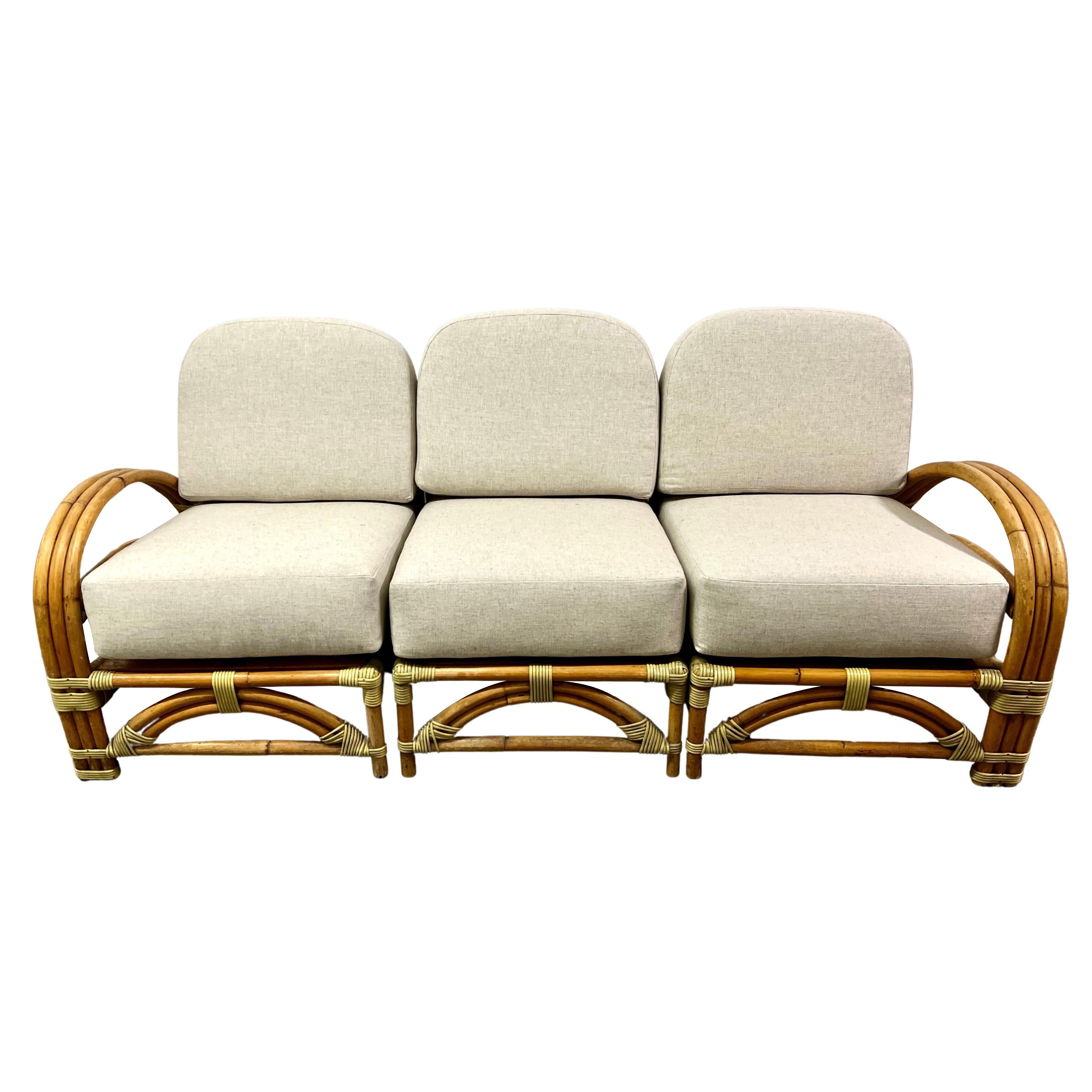 Ritts and Company Three Piece. Rattan Sofa with Custom Upholstery
