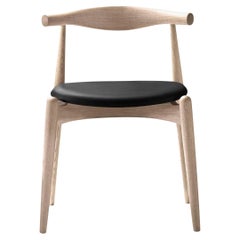 Hans J. Wegner 'CH20' Chair in Oak, Black Leather and Soap for Carl Hansen & Son
