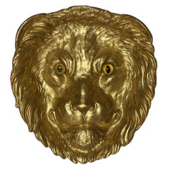 Cendrier / attrape-tout français ancien en forme de tête de lion en bronze doré avec yeux en verre