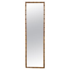 Slender French Early 20th Century Faux-Bamboo Mirror with Brown Patina