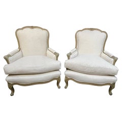 Pair of French Louis XVI Style Carved and Painted Bergeres