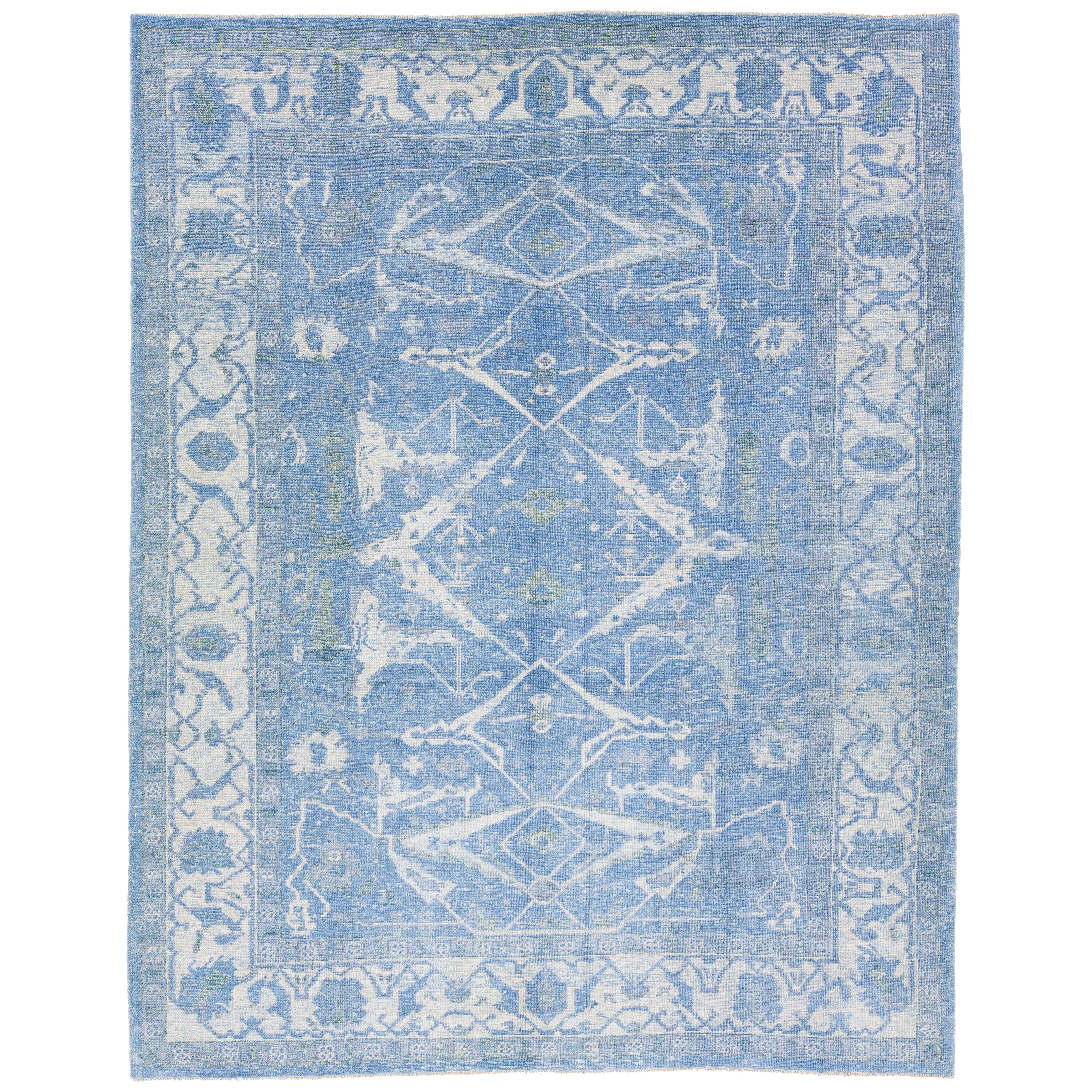 Blue Modern Turkish Oushak Handmade Wool Rug with White Geometric Motif For Sale