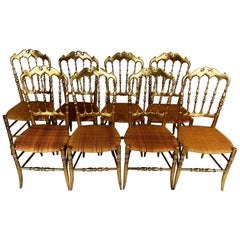 Set of 8 Italian Modern Neoclassical Dining Chairs in Carved Gilt Wood & Rattan
