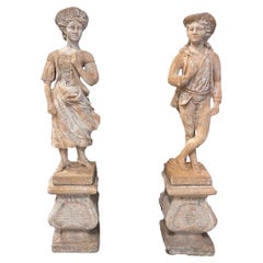 Pair of Vintage Cast Stone and Terracotta Victorian Figural Outdoor Statues