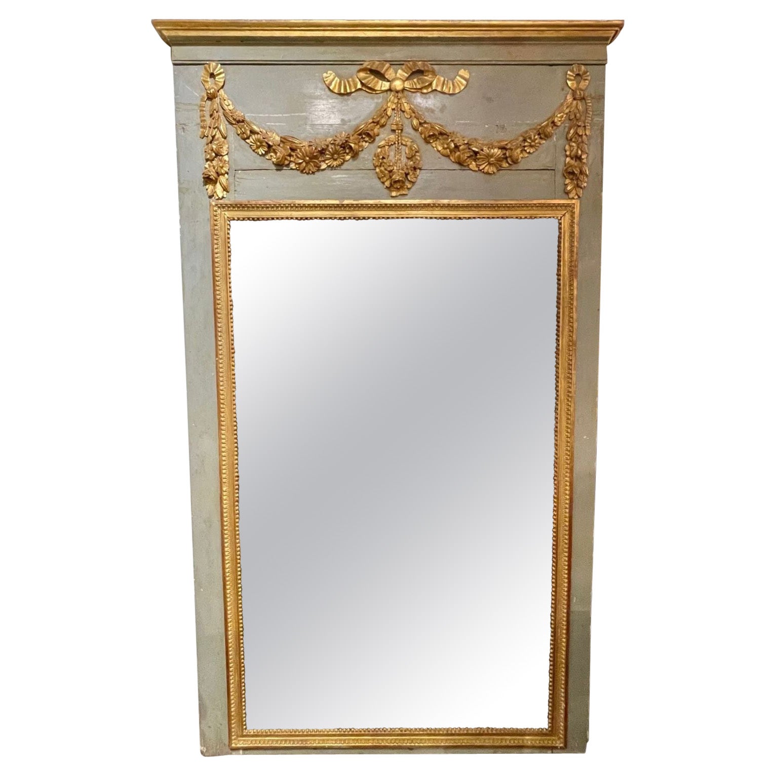 18th Century French Carved and Parcel Gilt Trumeau Mirror For Sale