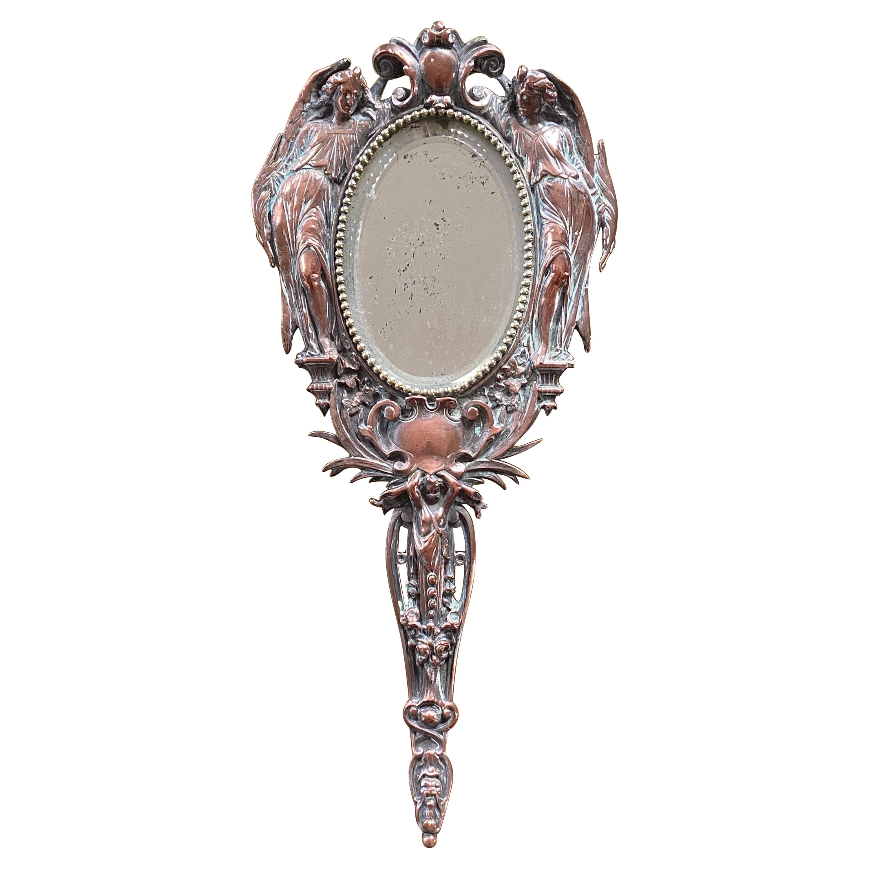 20th Century French Hand Mirror with Two Angels Surrounding the Oval Shape For Sale
