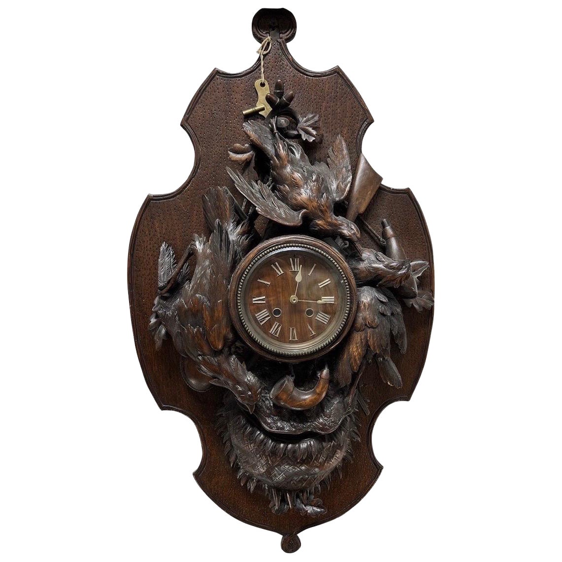 Monumental 19th Century Black Forest Carved “Spoils of the Hunt” Wall Clock For Sale