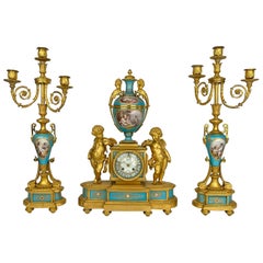 An Ormolu-Mounted Sevres Style Porcelain 'JEWELED' Turquoise-Ground Clock Set