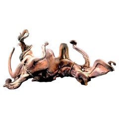 Sculpture de pieuvre géante découpée dans une pièce de bois naturel 180 x 100 x 90 cm.