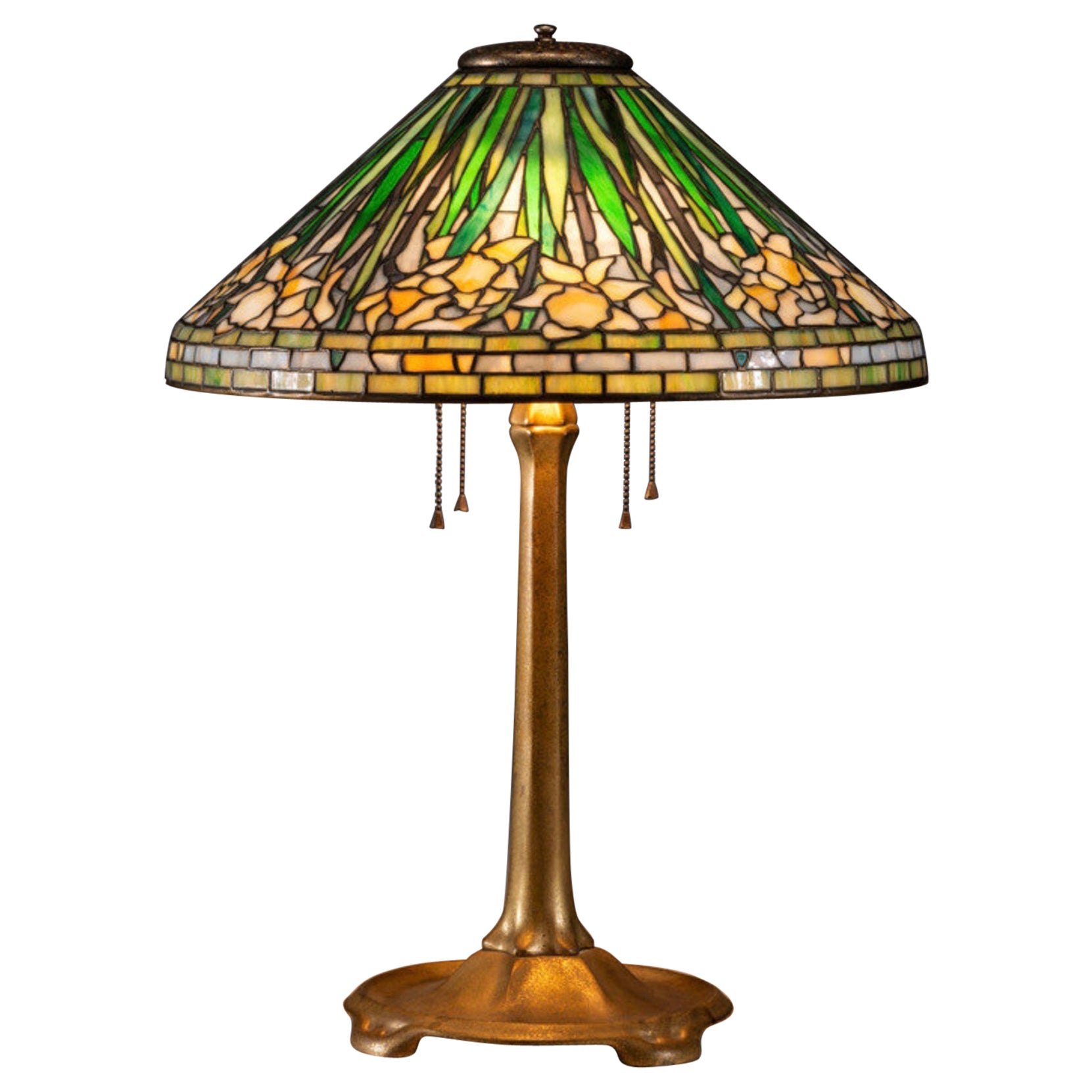 Tiffany Studios New York Daffodil Table Lamp Circa 1910

An American early 20th Century circa 1910 Tiffany Studios New York Art Noeveau table lamp of a larger proportion. The shade which I cal “Baby Blue” when not turned on is absolutely gorgeous