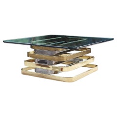 Table basse postmoderne empilée en chrome, laiton et verre biseauté