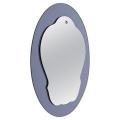 Specchio da parete ovale italiano dell'Arte Cristal Arte di metà secolo con cornice in vetro blu, anni '60