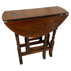 Ancienne table à abattant en chêne de petite qualité du 18e siècle