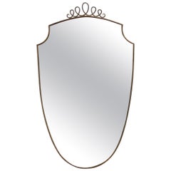 Vintage Italian Wall Mirror with Brass Frame and Top Flourish (circa 1950s)