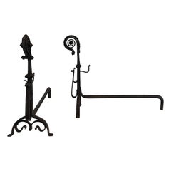 Pair of Tall Wrought Iron Andirons showing a Snail