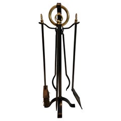 Modernist Steel, Iron and Brass Fireplace Tools by Jacques Adnet