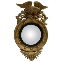 Gilded sculpted wood eagle convex mirror - c.19th century