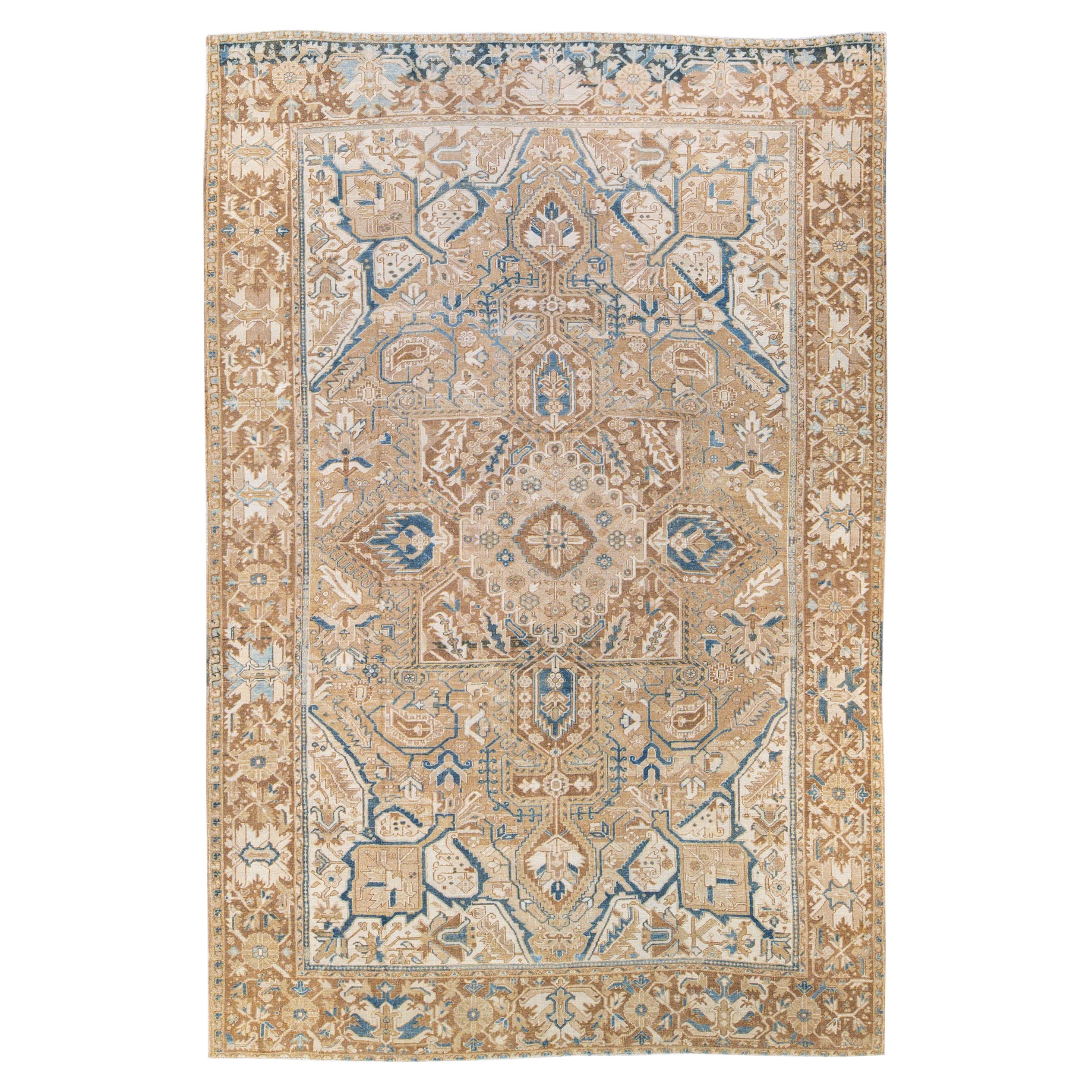 Antique Persian Heriz Handmade Medallion Tan and Blue Wool Rug For Sale
