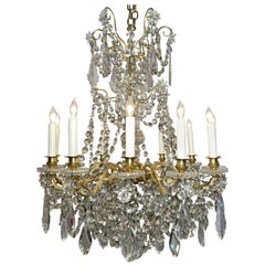 Antique French Cut Crystal and Gold Bronze 12-Light Chandelier, Circa 1875-1895.