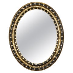 Irish Ebony and Gilt Oval Mirror with Faceted Glass Studs (H 29 1/4 x W 23 1/2)