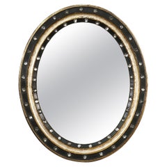 Irish Ebony and Gilt Oval Mirror with Faceted Glass Studs (H 22 1/4 x W 18 1/4)