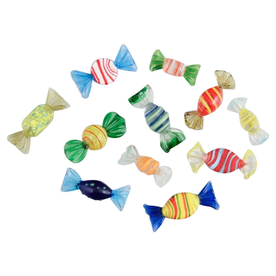 A collection of eleven pieces. Murano art glass, colorful, striped bonbons. For Sale