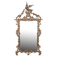 Vieux miroir décoratif en bois sculpté