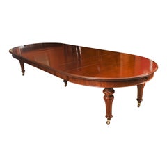 Ancienne table à manger à rallonge ovale William IV de 13 pieds en acajou flammé, 19ème siècle