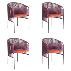 Ensemble de 4 chaises de salle à manger Caribe Chic orange violette de Sebastian Herkner