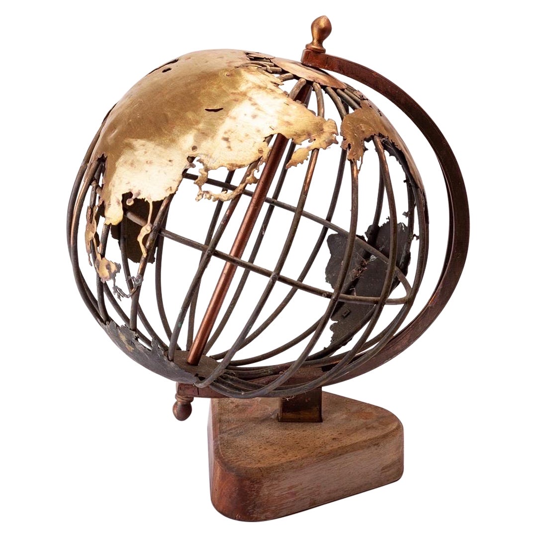 Art Object: “Terrestrial Globe” wrought iron,  brass and teak, France 1950ies For Sale