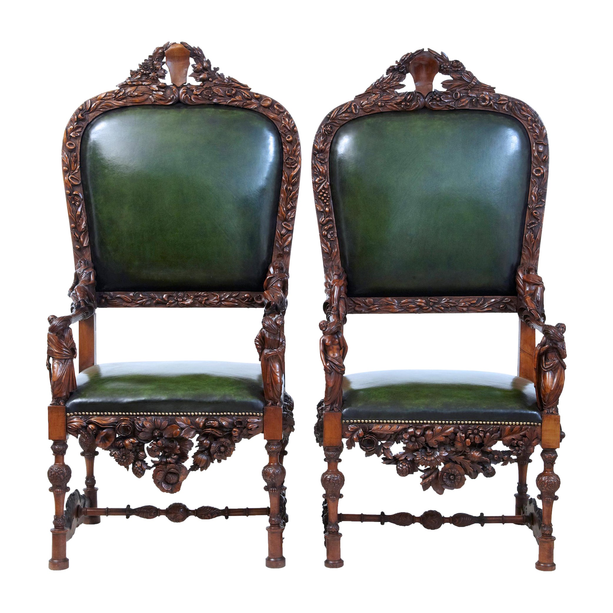 Impressive pair of 19th century carved walnut Florentine renaissance armchairs