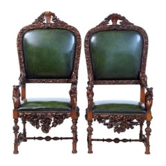 Impressive pair of 19th century carved walnut Florentine renaissance armchairs