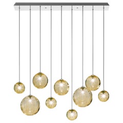 Lampe de marionnette multipendant Vistosi avec cadre en verre transparent ambré et chrome brillant