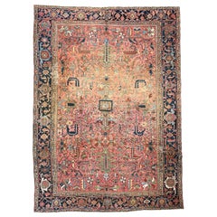 Magnifique tapis Heriz ancien en saumon/coral et vert 