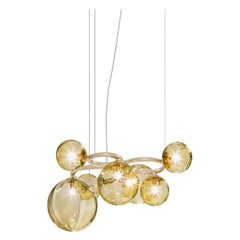 Vistosi-Pendelleuchte aus bernsteinfarbenem, transparentem Glas und mattem Goldrahmen
