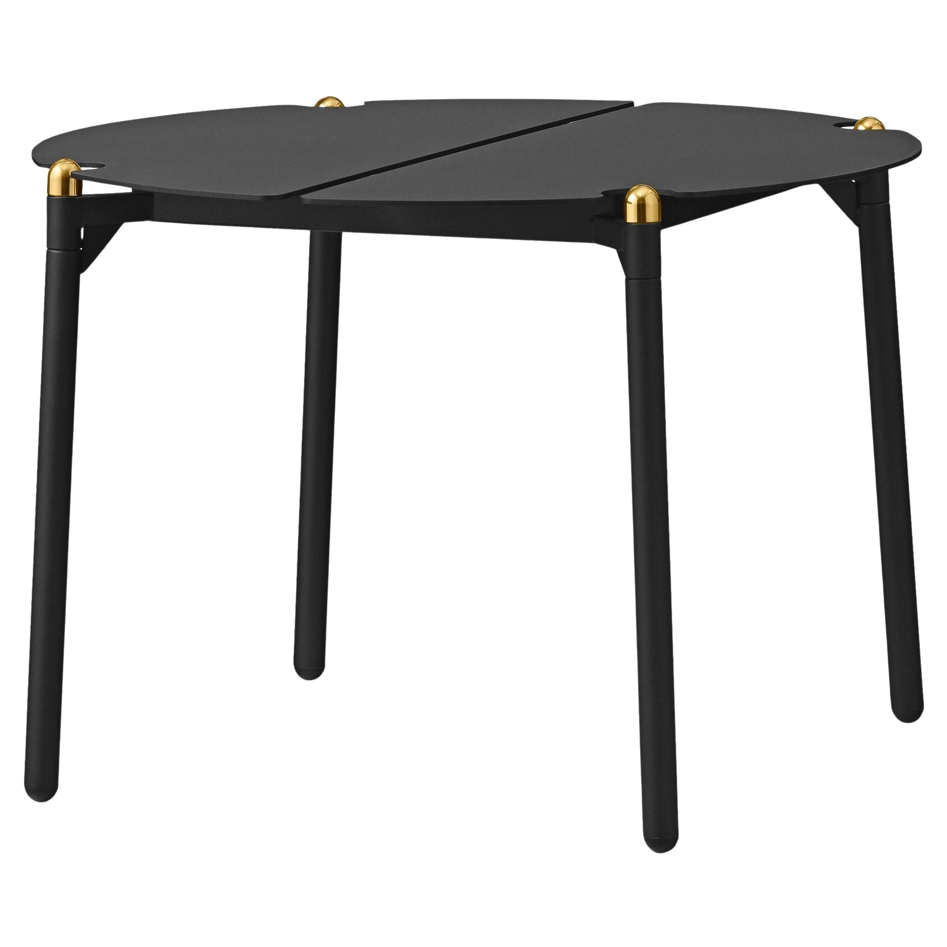 Petite table de salon minimaliste noire et dorée
