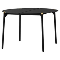 Grande table de salon minimaliste noire et dorée