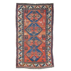Vintage Kazak Tribal Rug with Variations of Clay, Rust, Autumn