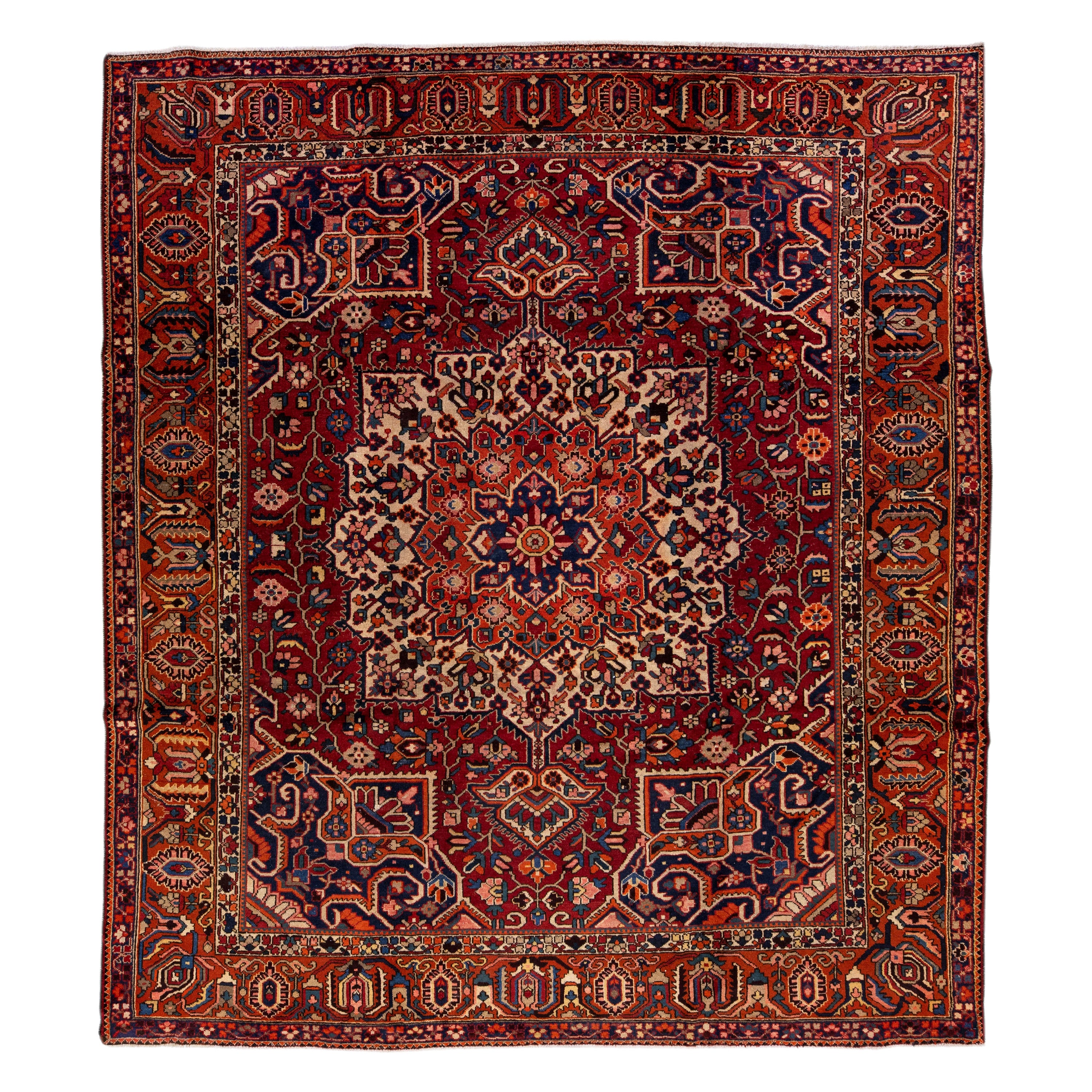 Room Size Handmade Antique Bakhtiari Persian Wool Rug in Red For Sale