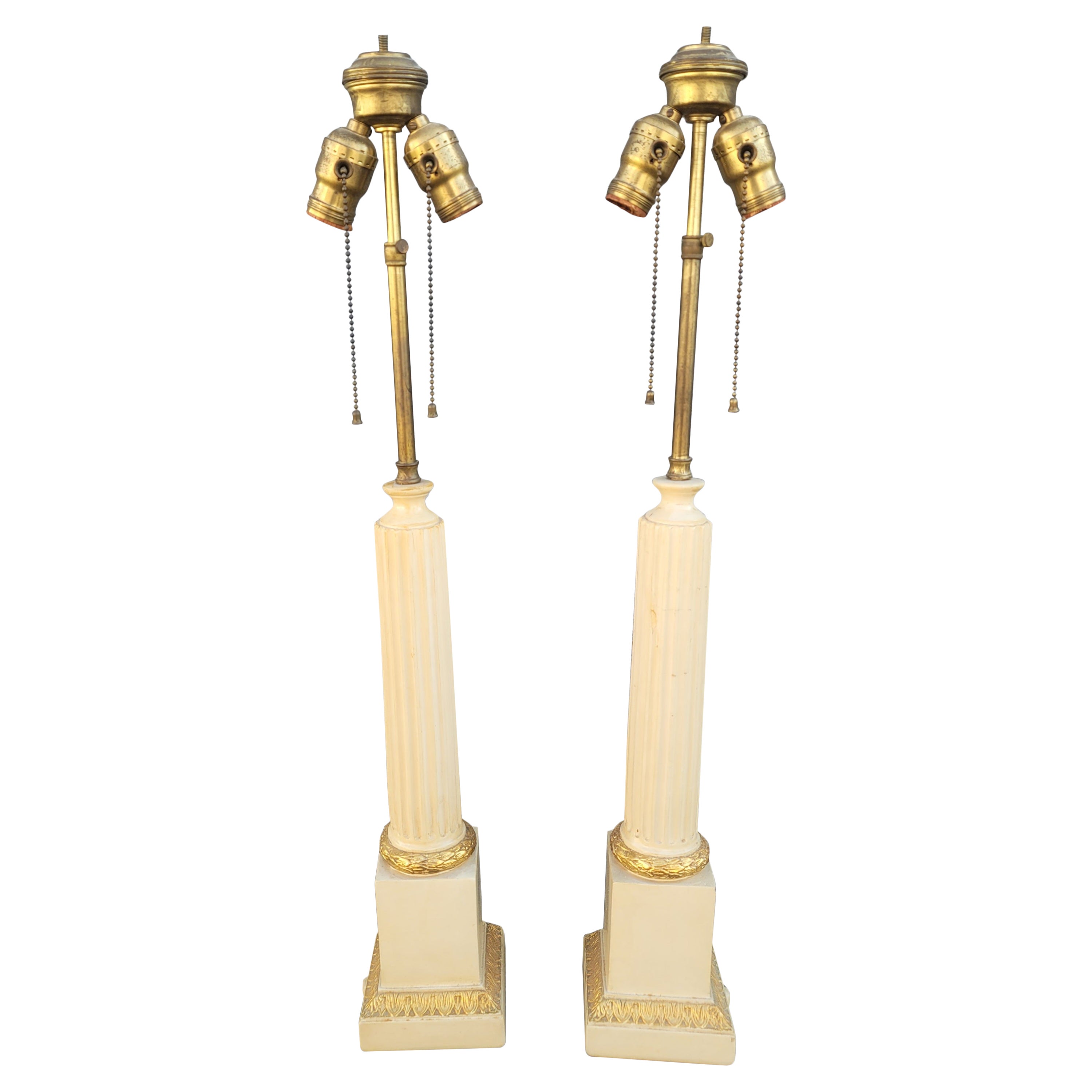 A Pair of Italian Art Deco Patinated and Gilt Ornate Plaster Tower Table Lamps For Sale