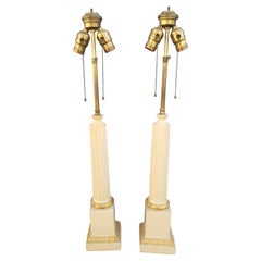 A Pair of Italian Art Deco Patinated and Gilt Ornate Plaster Tower Table Lamps