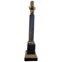  Italian Art Deco Ebonized and Gilt Ornate Plaster Tower Table Lamp