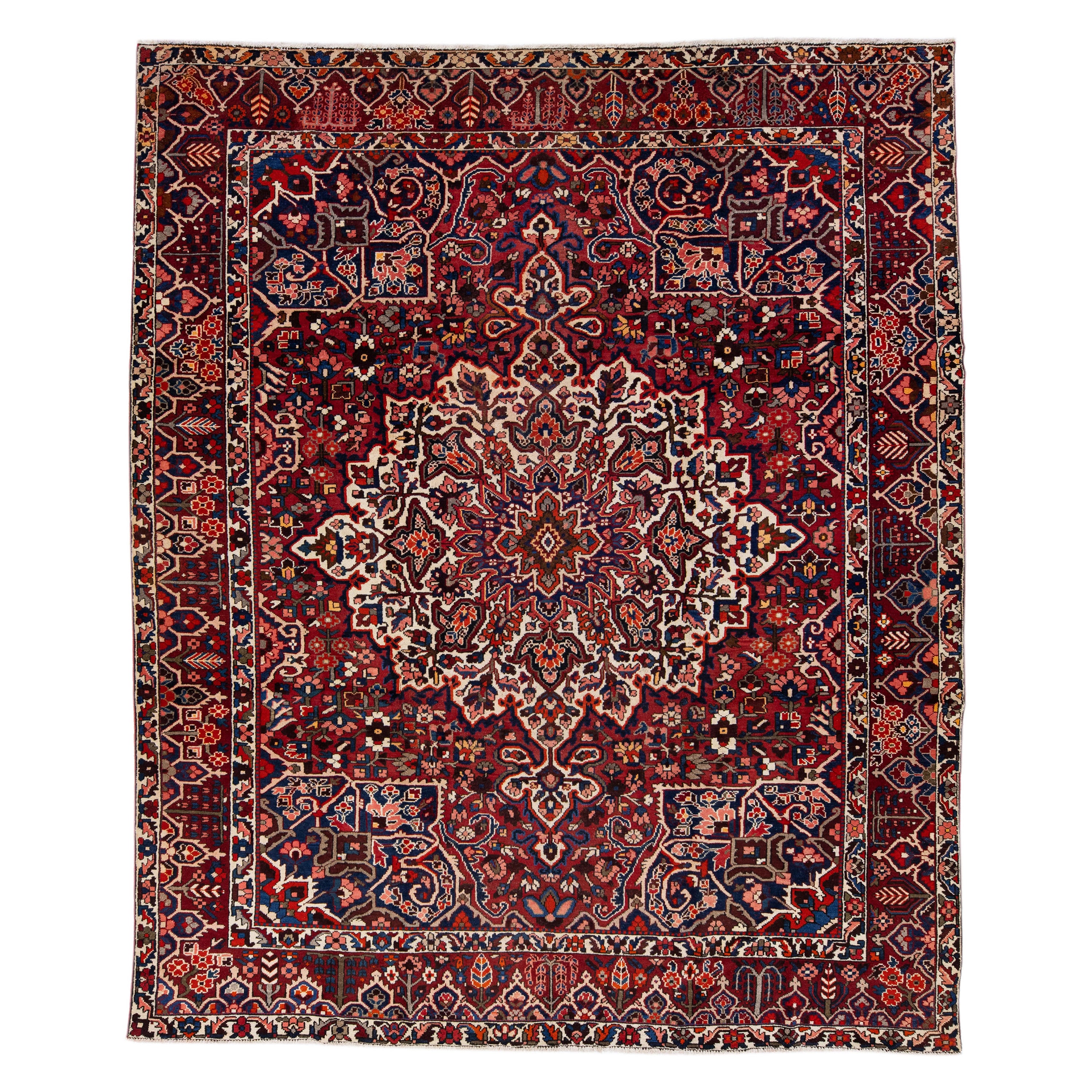 Red Handmade Antique Bakhtiari Persian Wool Rug with Medallion Motif For Sale