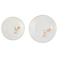 Two Rare Art Deco Meissen Plates with Hand-Painted Peacocks and Gold Decoration