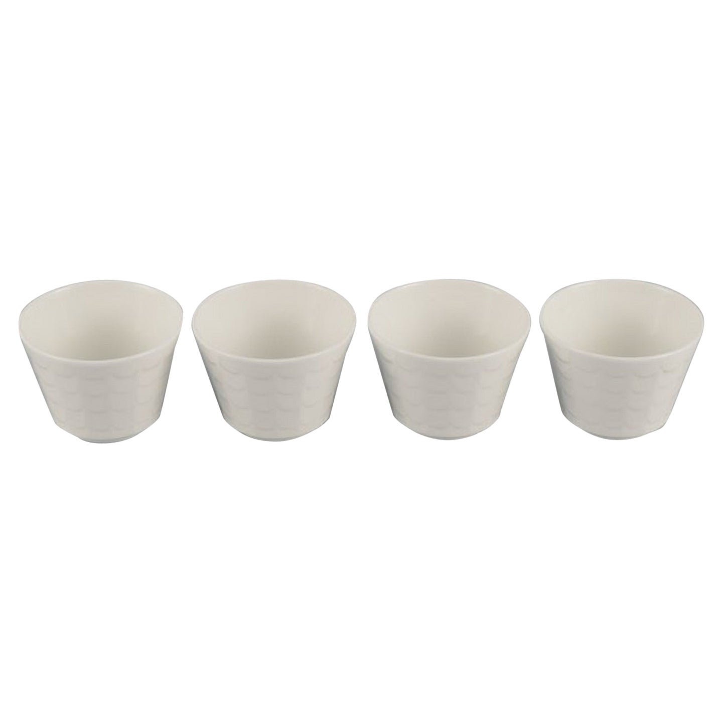 Wilhelm Kåge para Gustavsberg, Cuatro tapas de macetas de porcelana