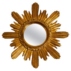 Beautiful Mid Century Sunburst Wall Mirror Made of Gilded Wood and Resin