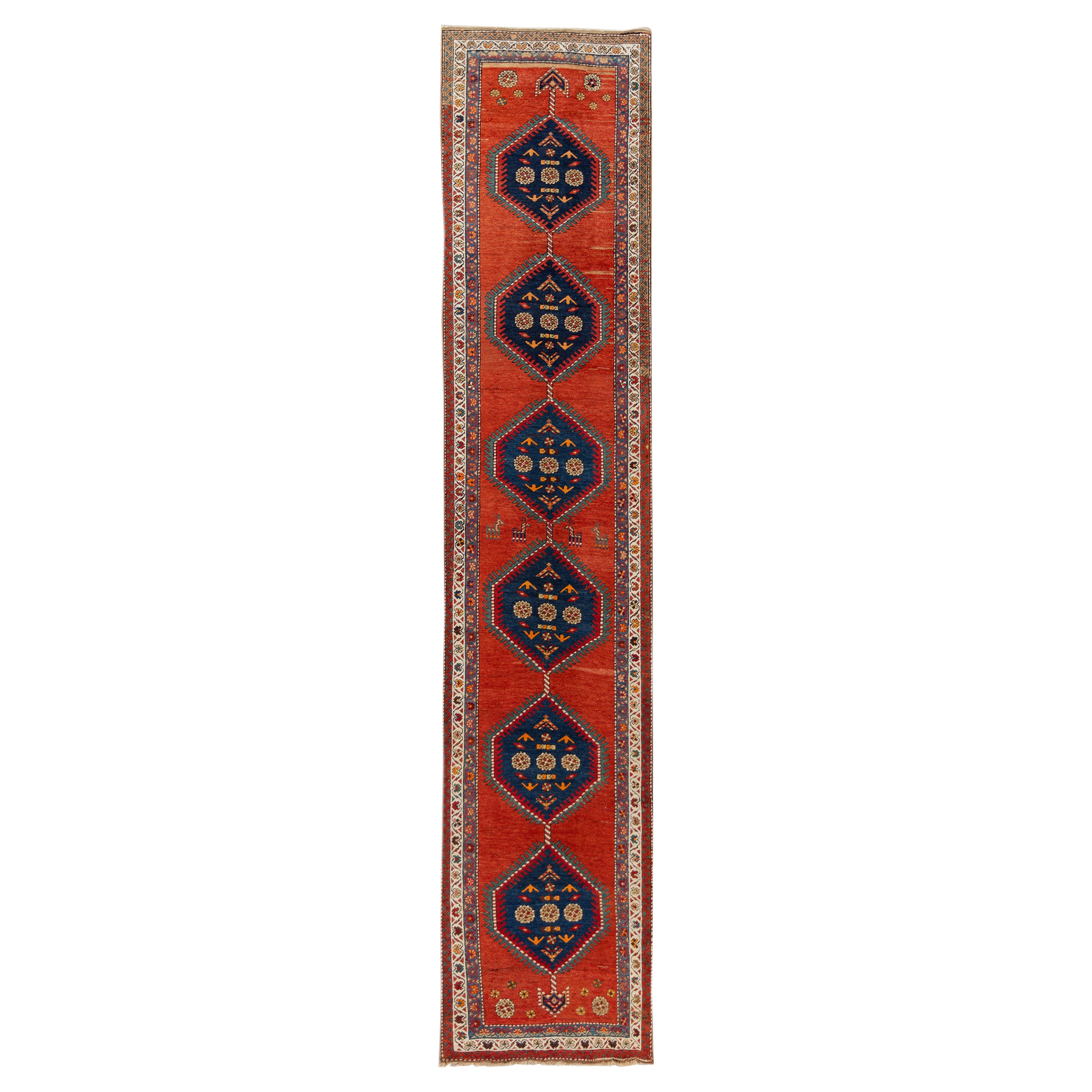 Antique Heriz Handmade Tribal Long Wool Runner With Rust-Orange Color For Sale