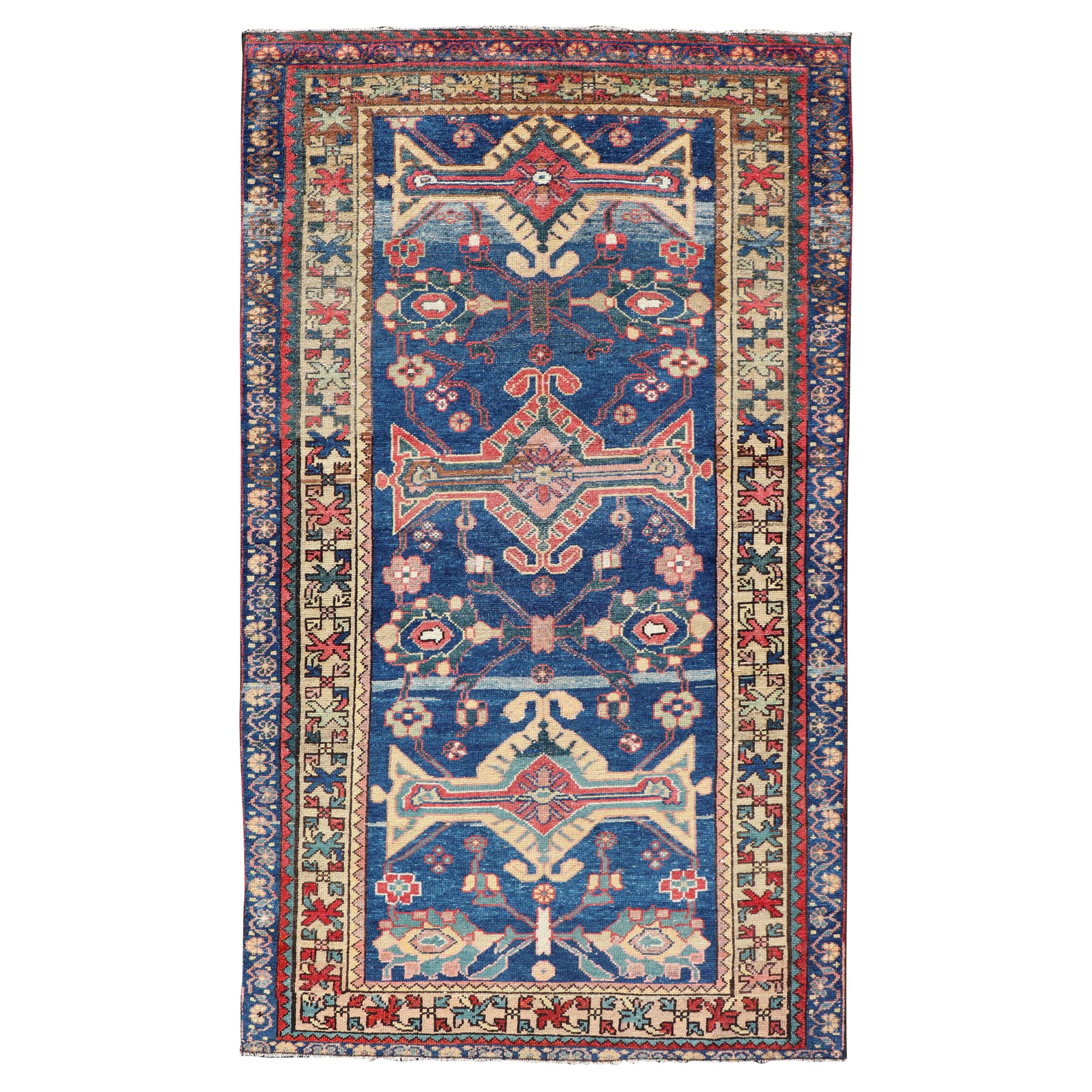 Antique Persian Hamadan Rug with Colorful Geometric Medallion on a Blue Field For Sale