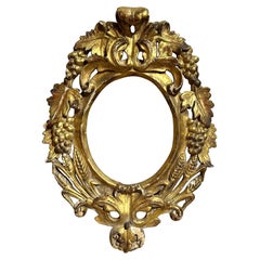 Early 19th Century Italian Carved and Giltwood Oval Frame